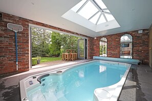 Private Swim Spa with Bi- fold Doors onto the Rear Garden 