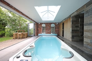 Swim Spa with Jets and two seats one side the spa