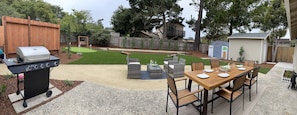 Backyard (with BBQ Grill, plenty of seating, putting green, and bocce ball)