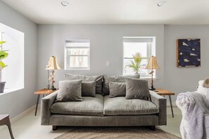 82” West Elm couch to put your feet up and relax after a day out skiing, hiking, eating, or shopping.