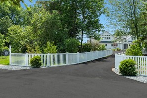 Driveway entrance to Brooklin House - red English mailbox on the right