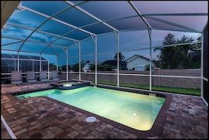 Why not take 5 steps out the back door to the private pool and spa!