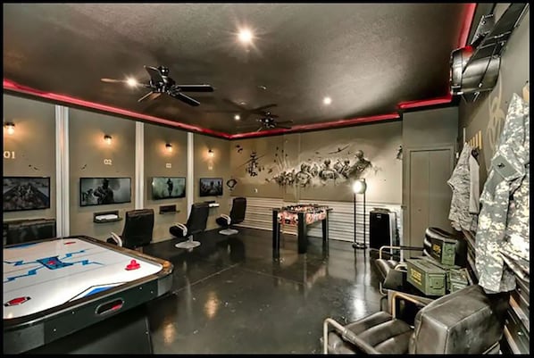 That's right! A Game Room to keep the kids occupied while the adults relax!