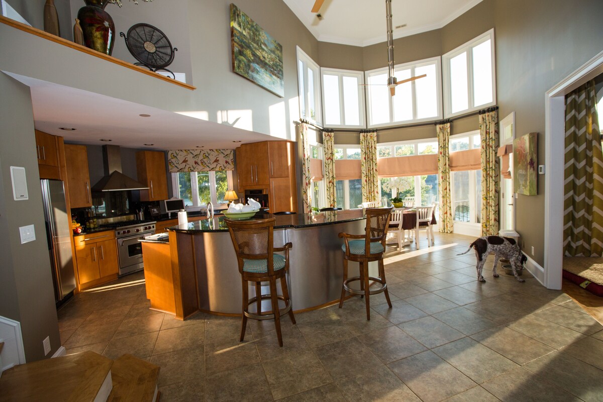 Luxurious one-of-a-kind  lakefront estate with breathtaking views and sunsets.