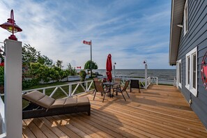 Expansive deck to sit back and relax or entertain with friends