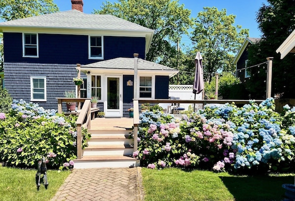 New wrap around deck, entrance from driveway to 1/2 bath, pantry and big kitchen