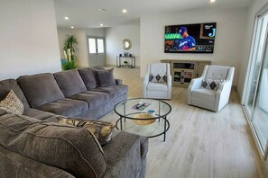 Relax in the Family Room with 75 inch TV