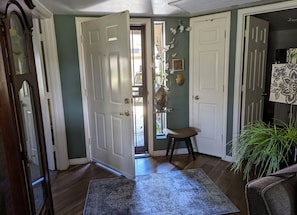 welcome! front door opens to foyer and then living room