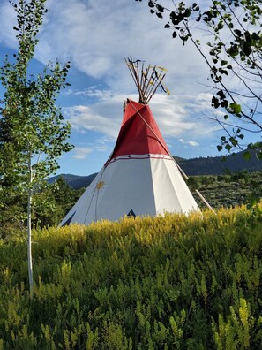This large TeePee comfortably sits 13+ around a gas firepit