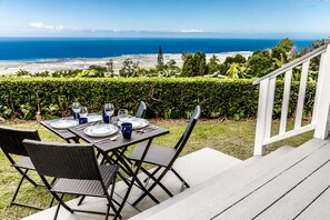 Enjoy gorgeous ocean coastline views while dining outside! Seating for four!   