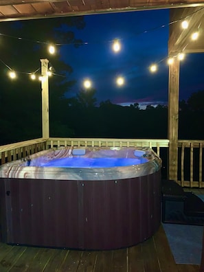 Soak in the hot tub under the stars.