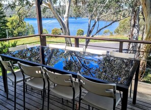 Outdoor dinning with lake views