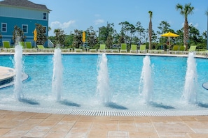 Resort style community zero entry pool is a short walk from the townhouse