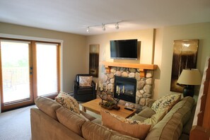 Basement living room with pullout sofa bed. 