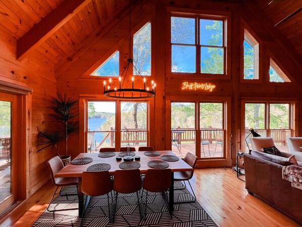 Dining room table seats 8 with beautiful lake views.