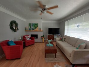 Living room with big screen smart tv!