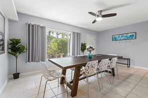 [Dining Room / Front Door] Seating for 8 at table, plus 2 more at the bartop