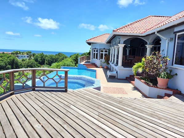 Sunning deck by pool.