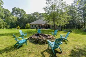 Backyard firepit and perfect spot for yard games