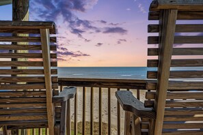 Relax in loungers, high-back chairs, or at the dining table while enjoying breathtaking sunrises and sunsets.