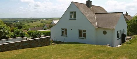 Trehanoo House and grass area of garden