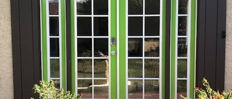 Front Entrance
Green doors inspired by Lamborghini Verde Mantis Green