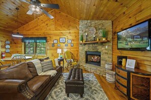 Living room with gas fireplace and TV with all your favorite streaming options