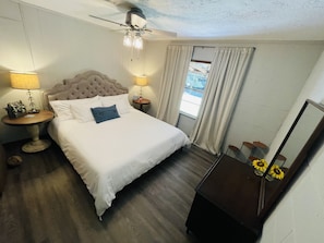 Master bedroom with king sized bed