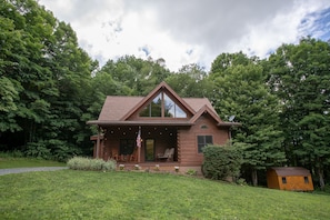 Classic Log Cabin Style with Large Grassy Yard