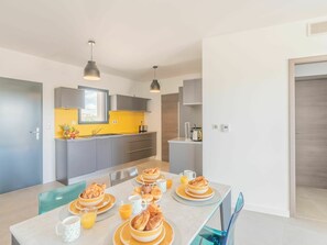 Tableware, Countertop, Cabinetry, Food, Table, Furniture, Property, Kitchen, Kitchen Appliance, Wood