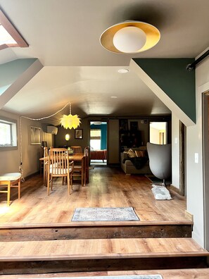 Step up into living room and dining area