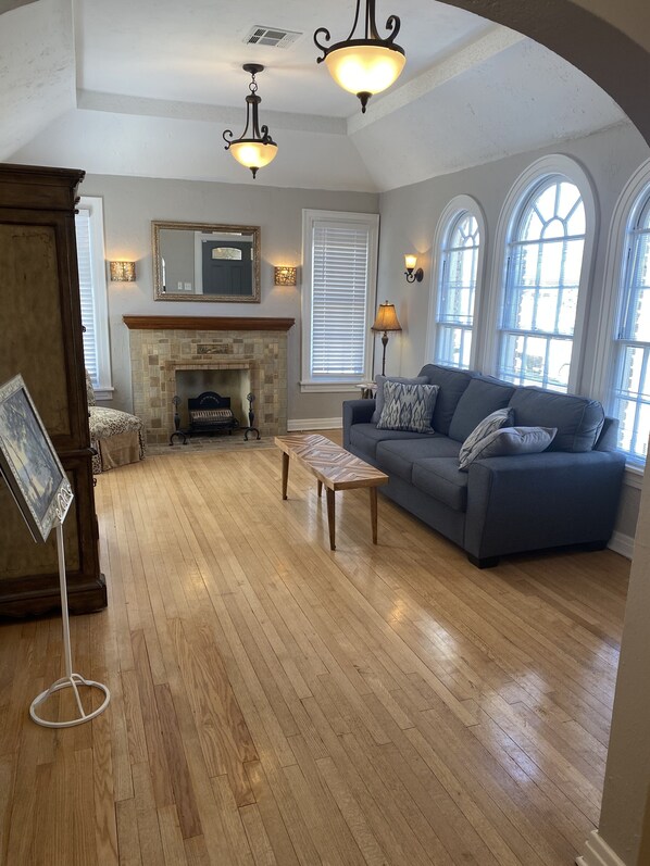 Living room sofa features a hide-and-bed.