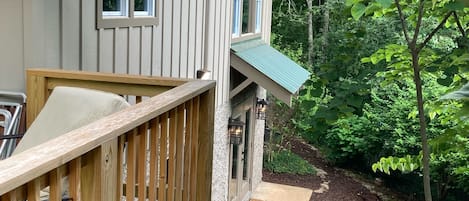 View from the outdoor back deck, looking toward the front door and garden