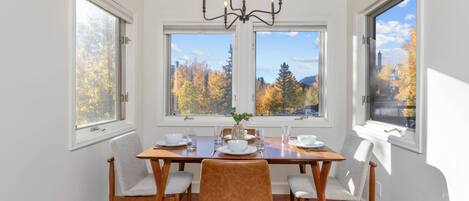 Dining room table offers seating for 4 with beautiful views