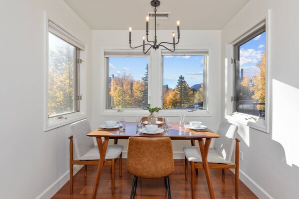 Dining room table offers seating for 4 with beautiful views