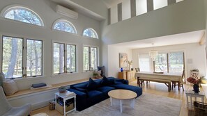 Open and bright living room with vaulted ceiling