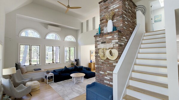 Open and bright living room with vaulted ceiling