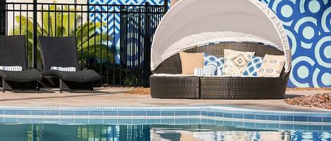 Relax poolside and take a dip in our pool