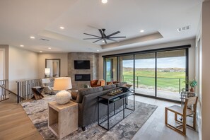 Living Room - The living room has a beautiful view of The Ledges Golf Course.