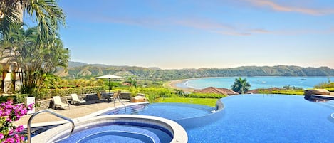 Pool area with great view of the bay and resort, located at the top of the hill.