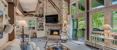 Living room with wood-burning fireplace