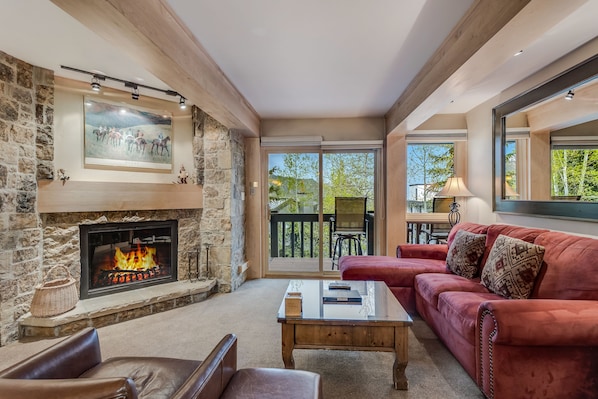 Living room with wood-burning fireplace