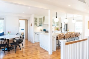 Chef's Kitchen with Expansive Island and Breakfast Nook