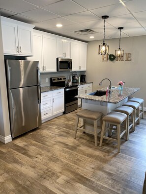 Enjoy a cup of coffee and prepare a quick meal in this fully equipped kitchen.