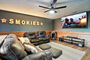 Theater and game room, features 85" smart TV w/surround sound. 60+ arcade games