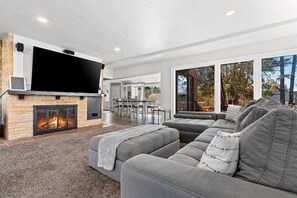 Elevate your relaxation with state-of-the-art entertainment in our cozy yet sophisticated living space.

