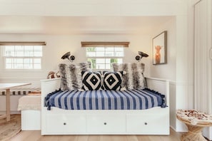 Our daybed converts into a super comfy KING sized bed!