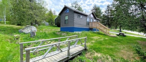 Picnic table and fire pits in the shared garden provide more opportunities to enjoy the outdoors and soak in the beautiful mountain views.