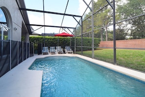 Private west-facing pool, no rear neighbors, loungers, dining area, lawn area
