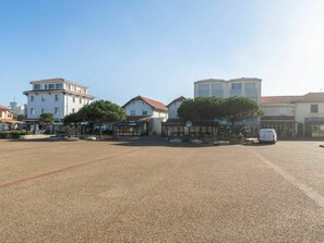 Sky, Plant, Building, Window, Road Surface, Asphalt, Land Lot, Urban Design, Tree, Landscape